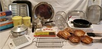 Nice clean kitchen items, strainers, wooden
