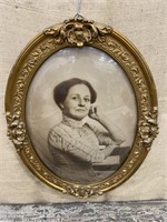 Lovely portrait of a woman in bowed glass frame