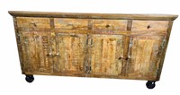 DISTRESSED SIDEBOARD ON INDUSTRIAL CASTERS
