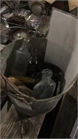 Bucket of misc glassware and broom