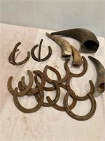 Horseshoes and horns.