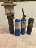 Propane bottles with light and torch.