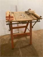 Portable table saw. Use your circular saw in it.