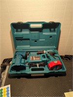 Makita power drill and light with charher