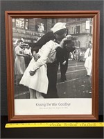 Photo of Kissing The War Behind on Times Square