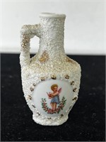 Antique Sanded Majolica Cupid Angel Porcelain