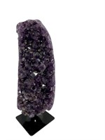 AMETHYST CLUSTER WITH INCLUSIONS ON STAND