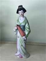 Porcelain geisha girl
