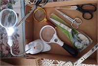 Magnifying glasses Ott lite task lamp Scissors