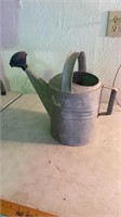Antique watering can