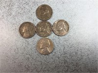 Five Jefferson nickels, 4 wartime
