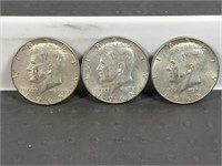 Three 1965 Kennedy half dollars
