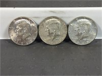 Three 1969D Kennedy half dollars
