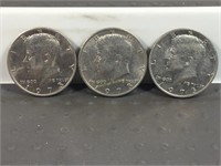 Three 1973 Kennedy half dollars