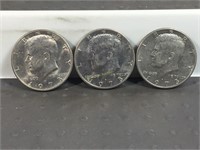 Three 1973D Kennedy half dollars