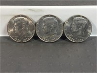 Three 1976D Kennedy half dollars