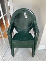 Four Green Plastic Patio Chairs