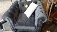 GRAY UPHOLSTERED CHAIR W/  THROW PILLOW