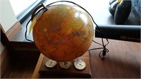 GLOBE LIGHTED , W / THERM ,BAROM,HUMIDITY GUAGES