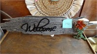 WELCOME SIGN ON OLD WOOD