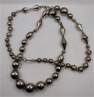 Silver tone graduated bead necklace 32 in