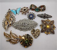 Lot of rhinestone brooches missing some stones