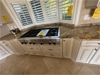 GRANITE COUNTER WITH CUTOUTS -  APPROXIMATELY 130'
