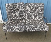 2 SEATER BLACK WROUGHT IRON SETTEE W/CUSHIONS