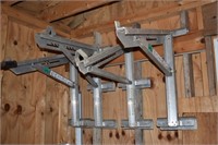 4 aluminum ladder jacks; as is