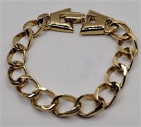Gold tone thick link bracelet 8 in