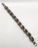 Silver tone modernist bracelet 7 in