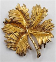 Gold tone textured leaf brooch