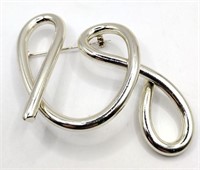 Silver tone abstract brooch