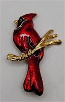 Gold tone enamel Cardinal brooch