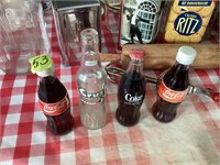 Old pop bottles - some full