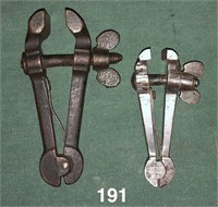 Pair of hand vises, both have intact springs