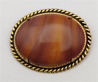 Gold tone Brown swirl oval brooch