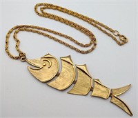 Gold tone movable fish necklace