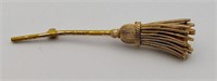 Lisner gold tone broom brooch
