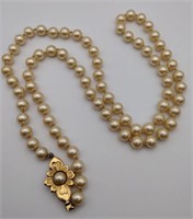 Gold tone faux pearl necklace 28 in