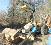Ford backhoe with newer engine, rest in parts