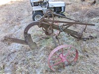 Pull type potato furrow maker on red steel wheels
