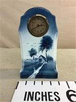 Pottery clock made in Germany. Wind up. Untested.