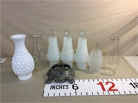 Lamp base and various glass chimneys- one milk