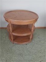 Three tiered wooden end table, 24 in high