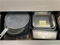 DRAWER IN BOTTOM OF STOVE - METAL WARE ITEMS