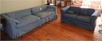 Lot #3738 - Blue slip covered sofa and blue and