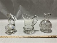 Glass pitchers and vase