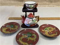 Miniature plates, teapot, cup