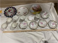 Decorative plates, iridescent teacups with